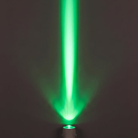 Aperture Beam Spotlight green beam effect on a dark wall