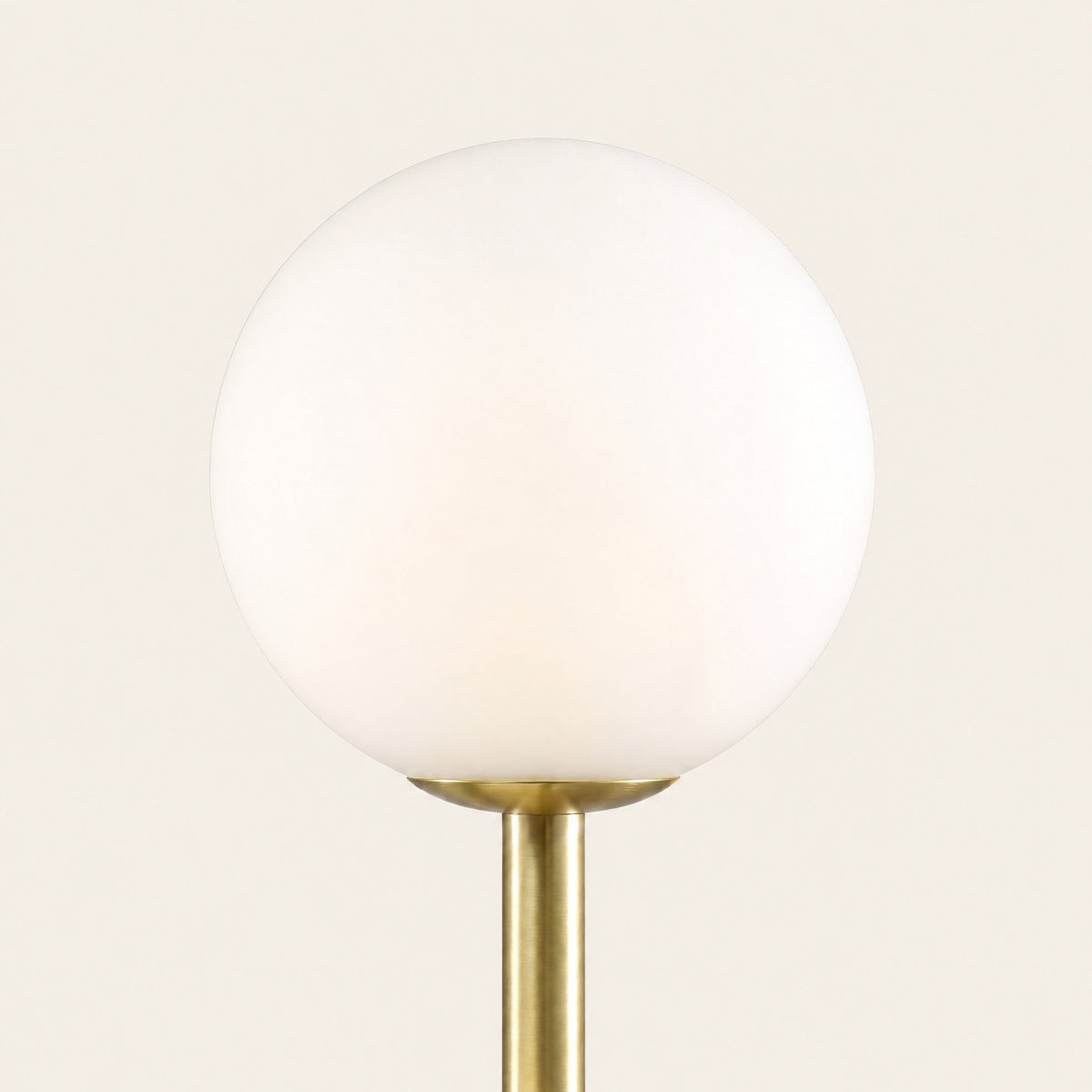 Trio Globe Floor Lamp — detail of glass globe and pole