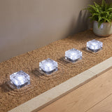 Glacier Solar Paver Light — patio edge at dusk