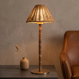 Cane Cordless Table Lamp — bedside lifestyle with leather chair