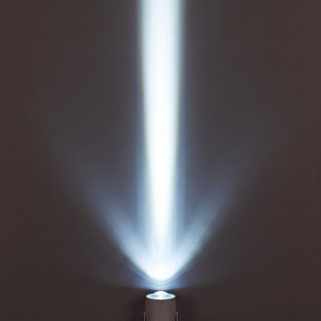 Aperture Beam Spotlight cool white beam effect on a dark wall