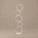 Nordic Ring Floor Lamp — White hero, warm taupe background