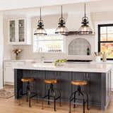 Foundry Glass Pendant — three pendants over a kitchen island