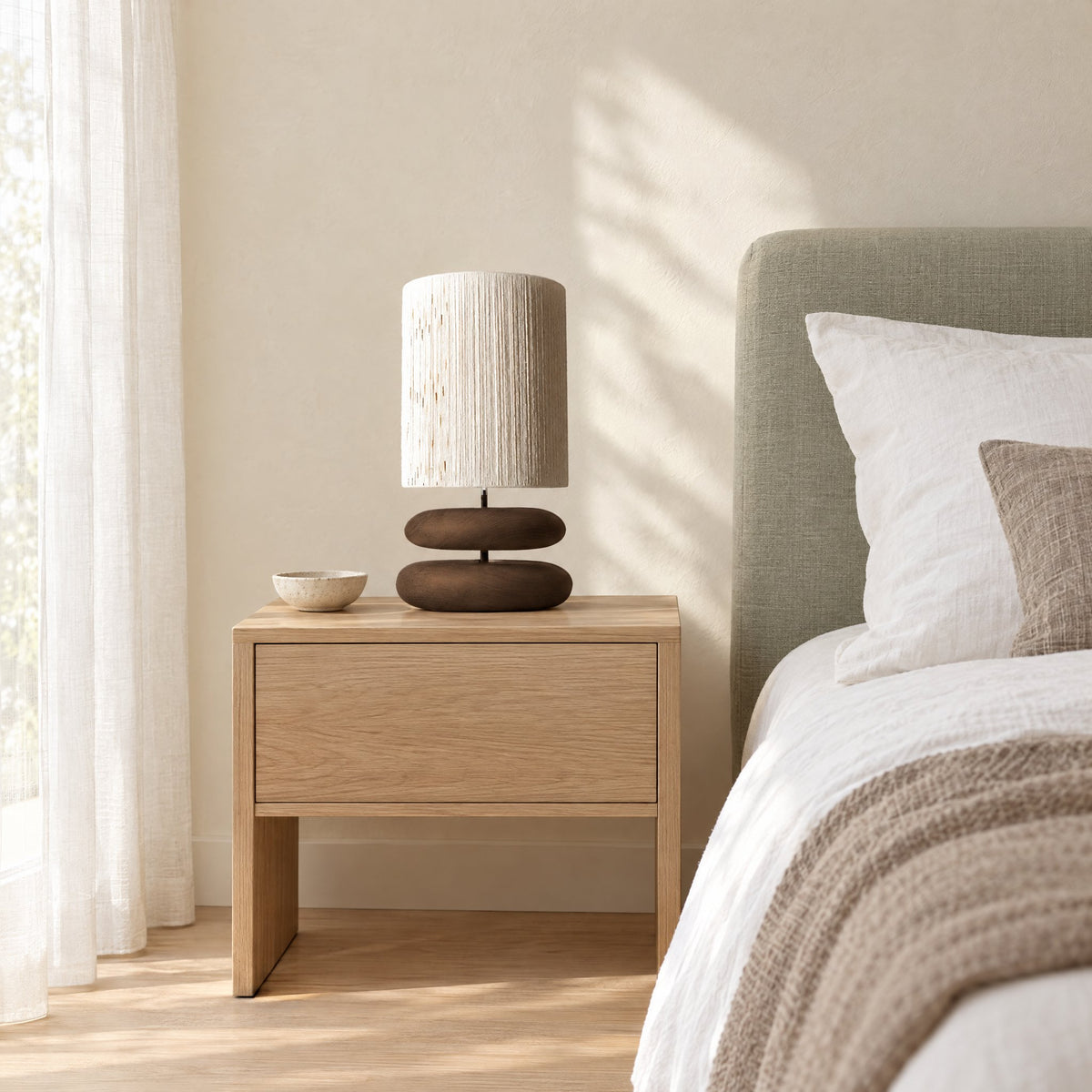 Dune Stacked Table Lamp — Walnut on an oak bedside table