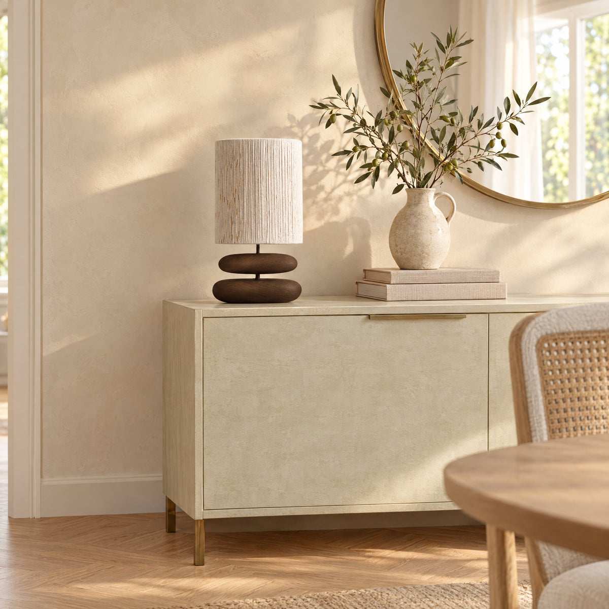 Dune Stacked Table Lamp — Walnut on a plaster sideboard in a dining room