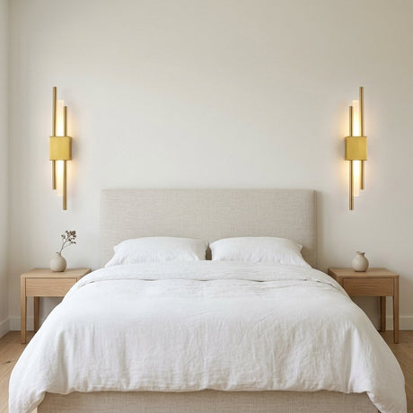 Duo Twin Rod Wall Sconce — mirrored pair beside a bed