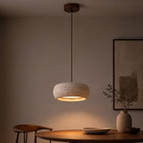 Ithaca Travertine Pendant — evening dining table lifestyle