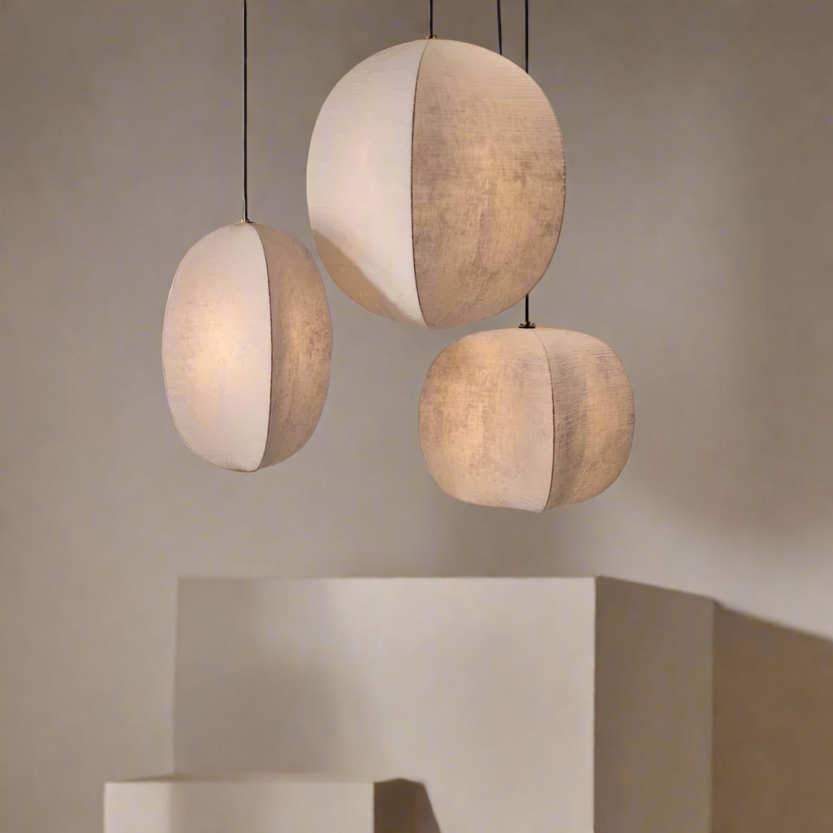 Kumo Linen Pendant — cluster over a plinth