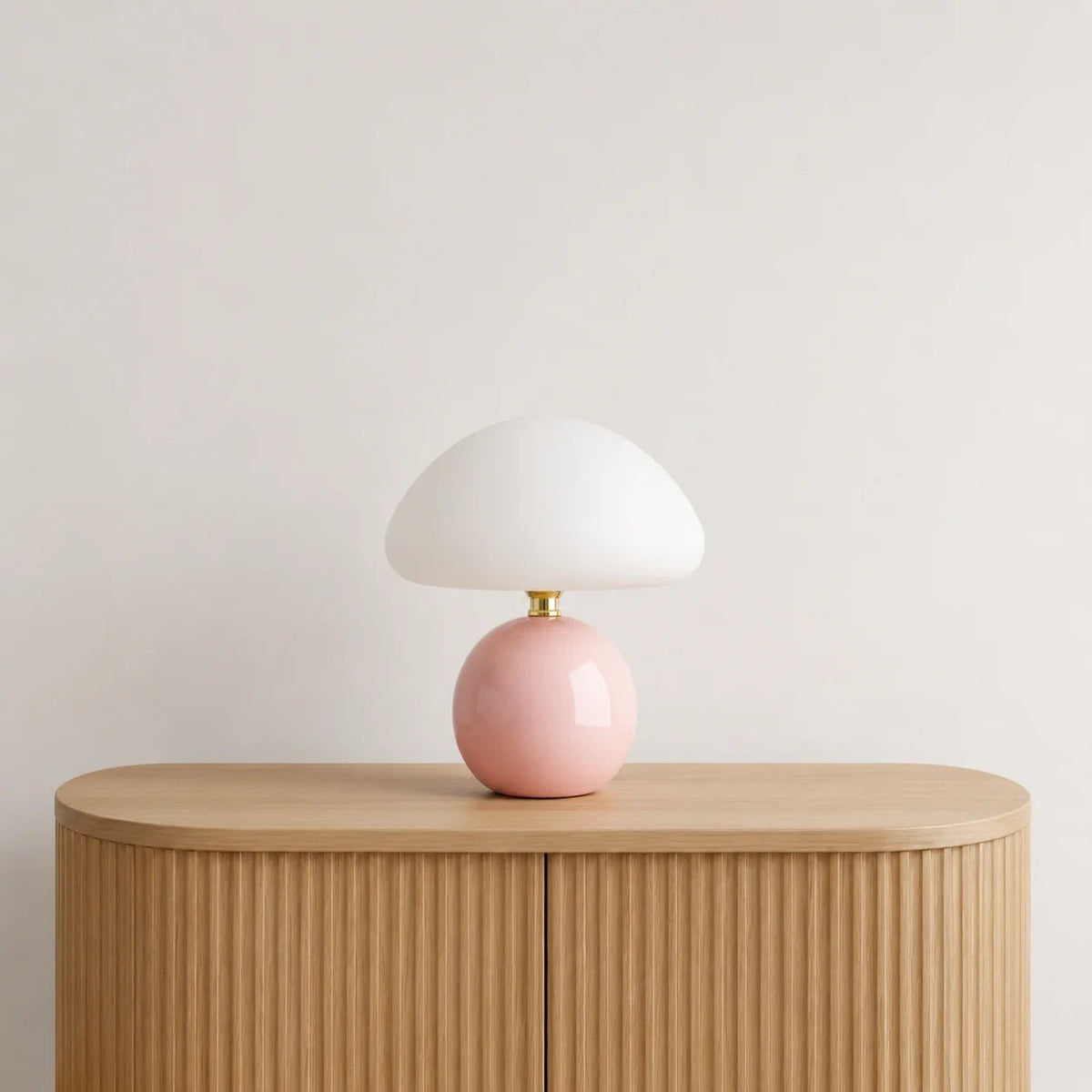 Bonbon Dome Table Lamp - Pink lamp on a console table