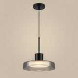 Puck Glass Pendant — Smoky Gray glass studio view