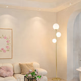 Trio Globe Floor Lamp — Gold with floral art