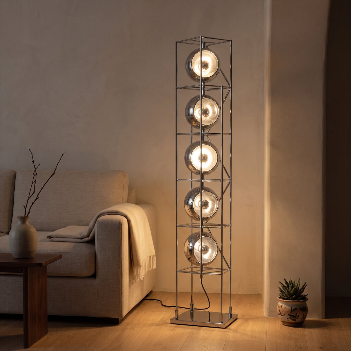 Orbit Bauhaus Floor Lamp — Silver beside turntable console