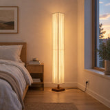 Hearth Walnut Wood Floor Lamp — bedroom in early evening, lamp on