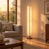 Hearth Walnut Wood Floor Lamp — living room at golden hour, lamp on