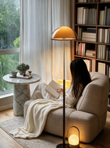 Ember Acrylic Dome Floor Lamp — reading chair lifestyle