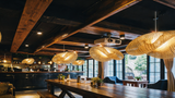 Wave Rattan Pendant Light — bar counter lifestyle