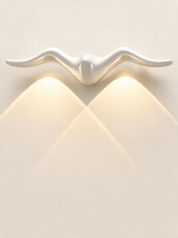 Aurelia Silhouette Wall Sconce - hero product shot (seagull, white)