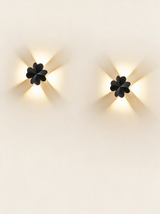 Aurelia Silhouette Wall Sconce - hero product shot (four-leaf clover, black)