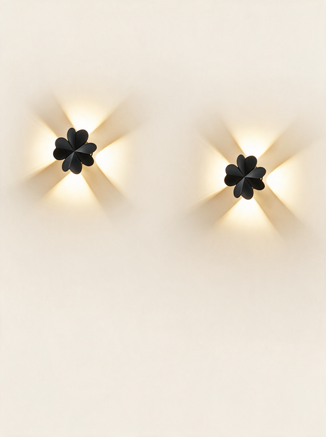Aurelia Silhouette Wall Sconce - hero product shot (four-leaf clover, black)