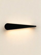 Aurelia Silhouette Wall Sconce - hero product shot (compass, black)