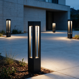 Rowan Aluminum Bollard Light - lifestyle image driveway entrance at night
