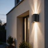 Arc Dual-Beam Wall Sconce - lifestyle image front door entryway at dusk