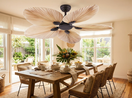 Palm leaf ceiling fan above dining area