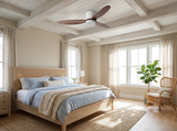 Natural wood ceiling fan in coastal-style bedroom