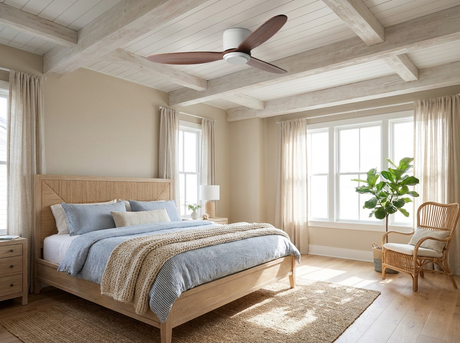 Natural wood ceiling fan in coastal-style bedroom