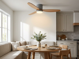 Natural wood ceiling fan in modern kitchen dining nook