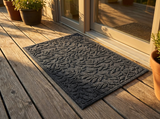 Polyester outdoor door mat on a wooden deck