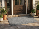 Grey doormat on front porch