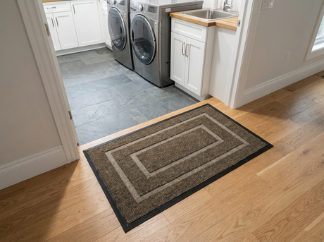 Dirt-trapper mat in a laundry room doorway