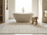 Oatmeal striped rug in a modern bathroom