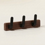 Upward-Curving Pegs Coat Rack — Walnut, front view