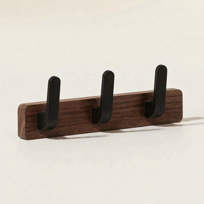 Upward-Curving Pegs Coat Rack — Walnut, front view
