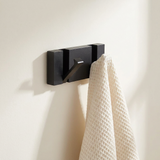 Foldable Wall Hook Rack — Black angled with ivory towel
