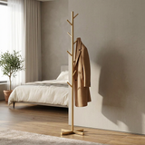 Tree-Branch Coat Rack Stand — Gold in a modern bedroom