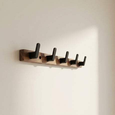Upward-Curving Pegs Coat Rack — Walnut, angled view