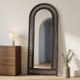 Wisteria Arch Full Length Mirror, Woven Lattice — above a walnut dresser