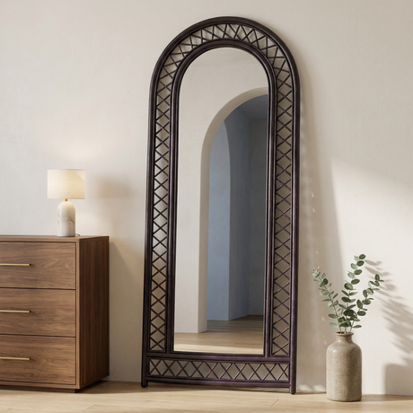Wisteria Arch Full Length Mirror, Woven Lattice — above a walnut dresser