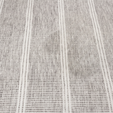 Malta grey striped washable rug — close weave and stripe detail