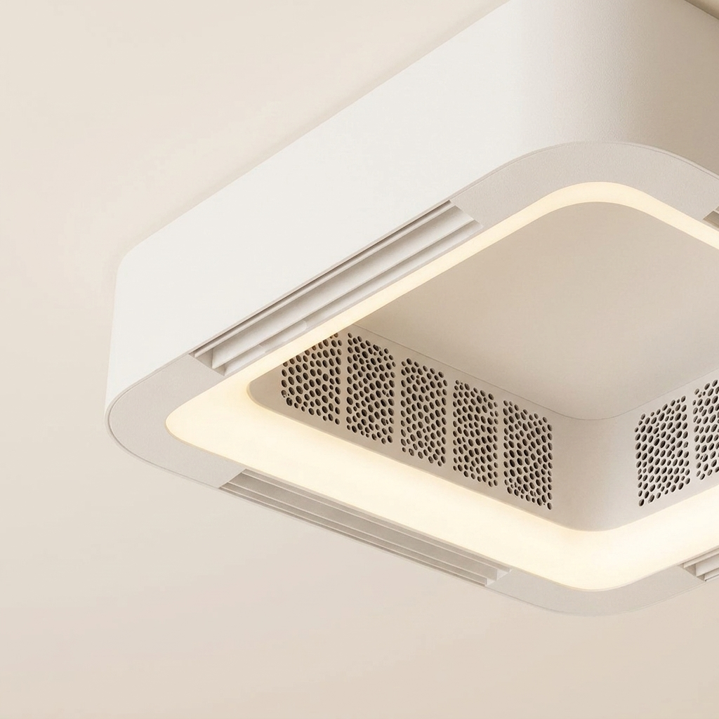 Close detail of the enclosed perforated grille and LED edge band