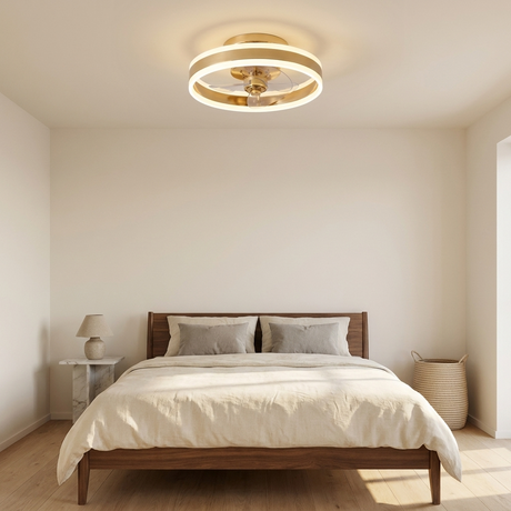 Gold flush mount ceiling fan in a contemporary bedroom