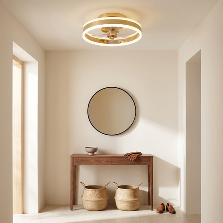 Gold flush mount ceiling fan in a stylish entryway