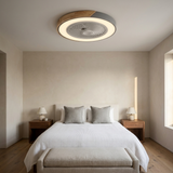 Bladeless flush mount ceiling fan in a contemporary bedroom