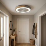 Bladeless flush mount ceiling fan in a welcoming entryway