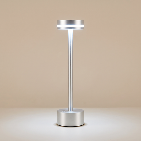 Drift Aluminum Table Lamp — Silver, switched on