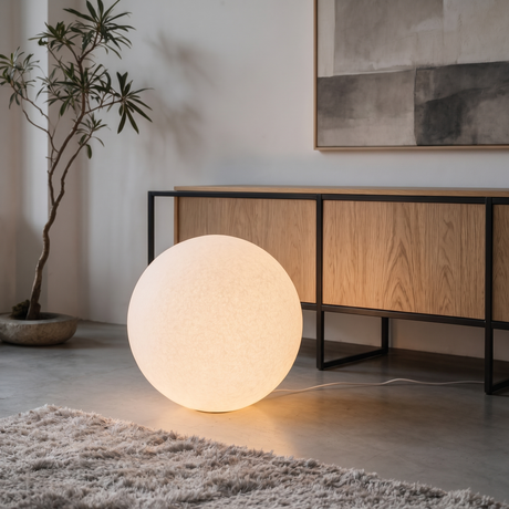 Luna Sphere Floor Lamp in front of an oak sideboard on a shaggy rug