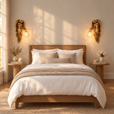 Seraphina Crystal Wall Sconce - left and right pair flanking a bed in a bright bedroom